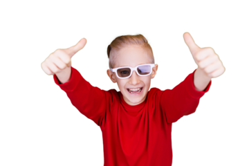 A boy on a transparent background in glasses shows a thumbs up and laughs merrily