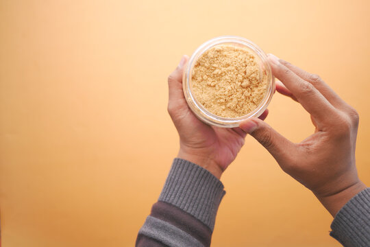 men holding a bowl sugar jar top view 