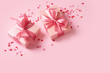 Candy pink confetti with gift box on pink background
