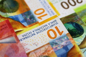 Swiss money. Business background. Swiss banknotes. Swiss cash.

