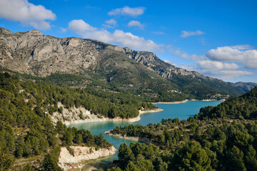 Fototapeta na wymiar Beautiful Guadalest reservoir with turquoise blue waters in the province of Alicante. Spain