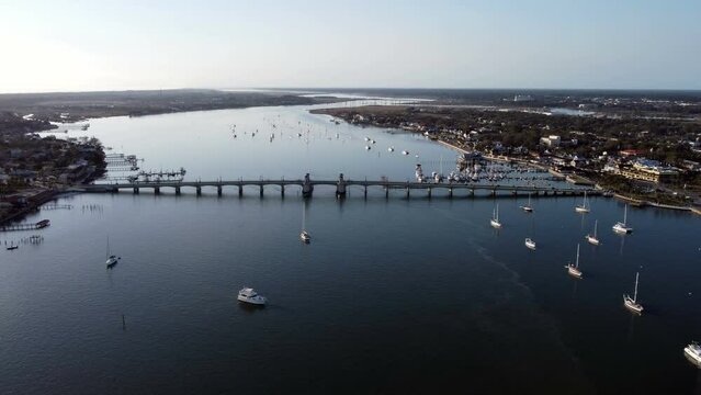 High altitude drone shot flying away from the bridge of lions Saint Augustine