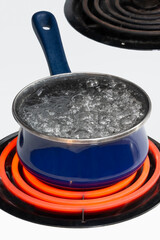 Boiling Pot of Water On Stove Top Vertical