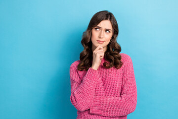 Photo of dissatisfied lady wear pink trendy clothes look empty space weird doubtful offer isolated on blue color background