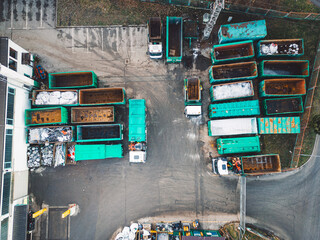 Birds eye view at empty containers for recycling purposes at the recycling center 
