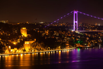 Fototapeta na wymiar Fatih Sultan Mehmet Bridge and Rumeli Fortress in the Night Lights Photo, Kavacık Beykoz, Istanbul Turkiye