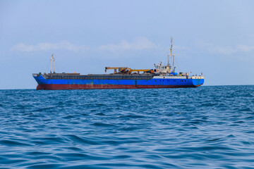 Large industrial ship sailing in the Indian ocean near Zanzibar, Tanzania