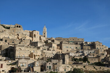 Fototapeta na wymiar The old town of Matera under a blue sky, Italy 