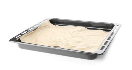 Baking sheet with paper isolated on white background