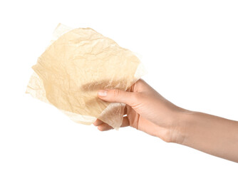 Female hand with sheets of baking paper on white background, closeup
