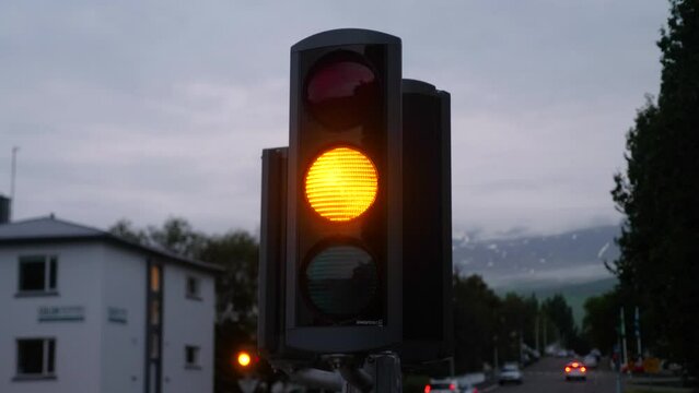 Outdoor vertical traffic light with heart symbol on the red color in Akureyri, Iceland. High quality 4k footage