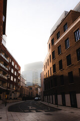 London street at sunrise with building in background