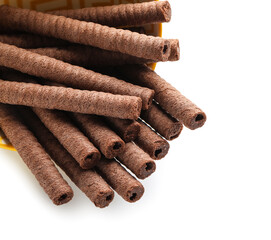 Delicious chocolate wafer rolls isolated on white background