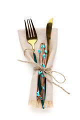Fork and knife in napkin tied with string isolated on white background