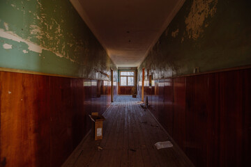 Dark dirty corridor of old abandoned building