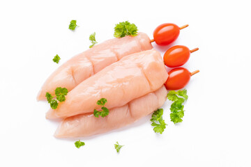 Skewers raw meat and vegetables.Top view.Raw chicken inner on skewers with tomatoes white background with spices, herbs.Raw uncooked Chicken meat,kebab on skewers.Chicken Skewers breast fillet meat.