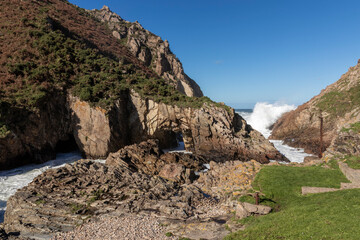 Amazing view of grassy rocky cliffs by the cantabrian sea with violent waves, asturias, spain - Asturian concept
