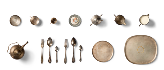 Vintage Silverware, antique spoons, forks, knives, ladle, cake shovels, kettle, tray and kettle isolated on isolated white background. Antique silverware. Retro.Vintage household items, silverware