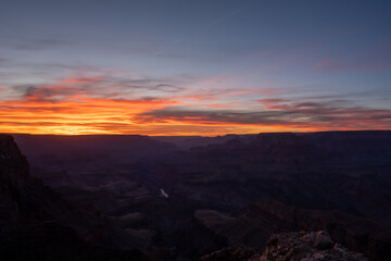 Fototapeta na wymiar Streaks of Sunset Light Over the Grand Canyon