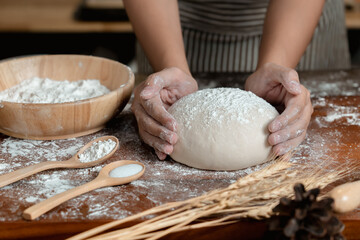 View of Asian woman hands prepare and rest the dough before putting the Dough into the oven