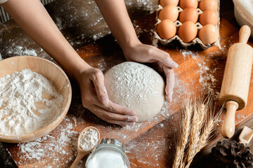 View of Asian woman hands prepare and rest the dough before putting the Dough into the oven