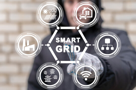 Industry engineer or worker using virtual touch screen presses inscription: SMART GRID. Concept of smart grid. Industrial and smart city network. Renewable Energy and Smart Grid Technology.