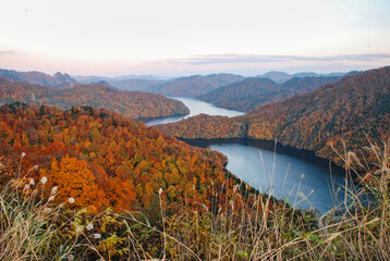 Naklejka premium Japanese scenery Minami-Aizu autumn landscape with lake and mountains