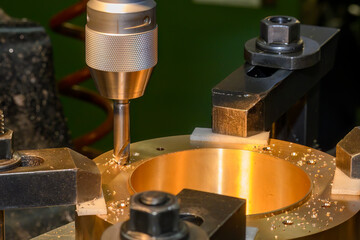 The hole chamfer process on NC milling machine with brass material.