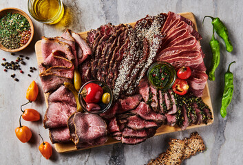 Charcuterie board with assorted meats