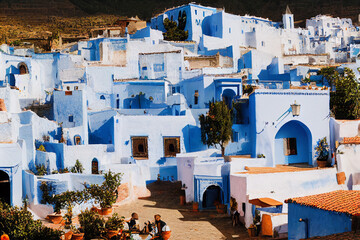Naklejka premium Chefchaouen the blue city in Morocco with blue buildings and blue stairs, generative AI