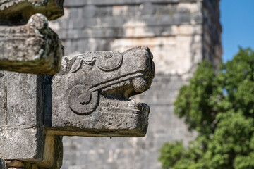 Large snake head sculptures at Chichen Itza Archaeological Zone.