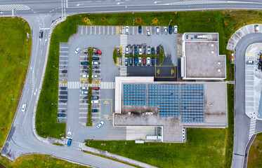 Top down view of a commercial building with solar panels