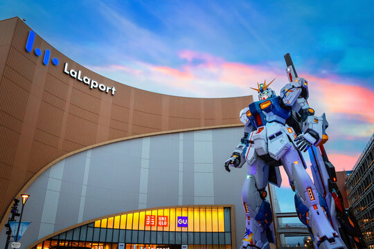 Fukuoka, Japan - Nov 20 2022: Full-size Mobile suit RX-93ffv (Nu) Gundam at the Gundam Park in front of Mitsui Shopping Park Lalaport Fukuoka.