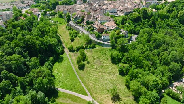 Aerial Reveal Aubonne Medieval Town Surrounded By Nature Landscape In The Canton of Vaud In Switzerland.
