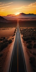 Aerial drone shot of an empty long mountain road leading to the horizon during a bright sunset on a sunny summer day. Generative AI