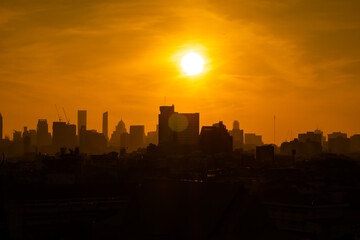silhouette city  against the sky on a sunrise Bangkok city. 