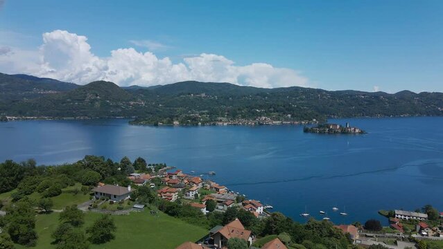 Aerial establishing shot of beautiful town in Italy, Piedmont Pella.