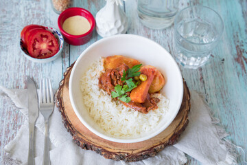 Beef stew estofado Assorted food plates Peru traditional comfort food buffet table