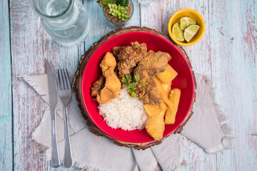 Fried fish with yuca Assorted food plates Peru traditional comfort food buffet table