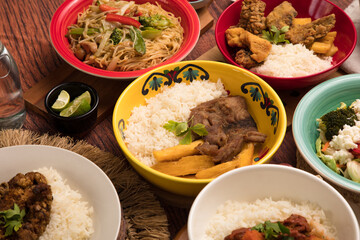 Assorted food plates Peru traditional comfort food buffet table