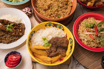Assorted food plates Peru traditional comfort food buffet table