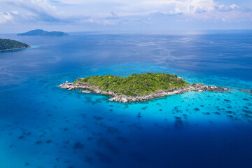 aerial view of the Similan Islands, the Andaman Sea, with natural blue waters, tropical seas, impressive views of the island's beauty. The island is shaped like a heart.