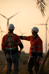 Engineers working on wind farms for renewable energy are responsible for maintaining large wind...