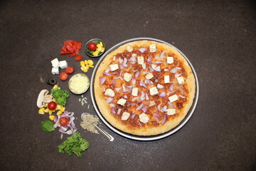 pizza on a on - paneer and onion