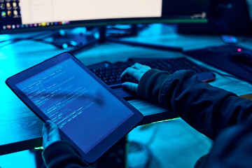 Tablet, html screen and programmer hands with coding software system for cyber security or hacking. Information technology, programming or coding hacker person with data, server and neon dark office