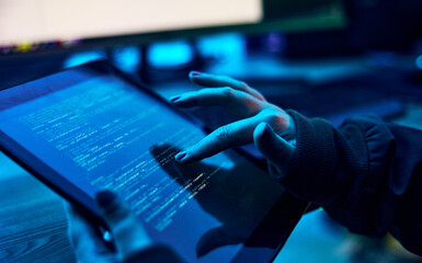 Tablet, programmer hands and html screen for coding software system. cyber security ro database...