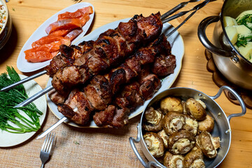 russian feast, kebab and boiled potatoes traditional Russian food