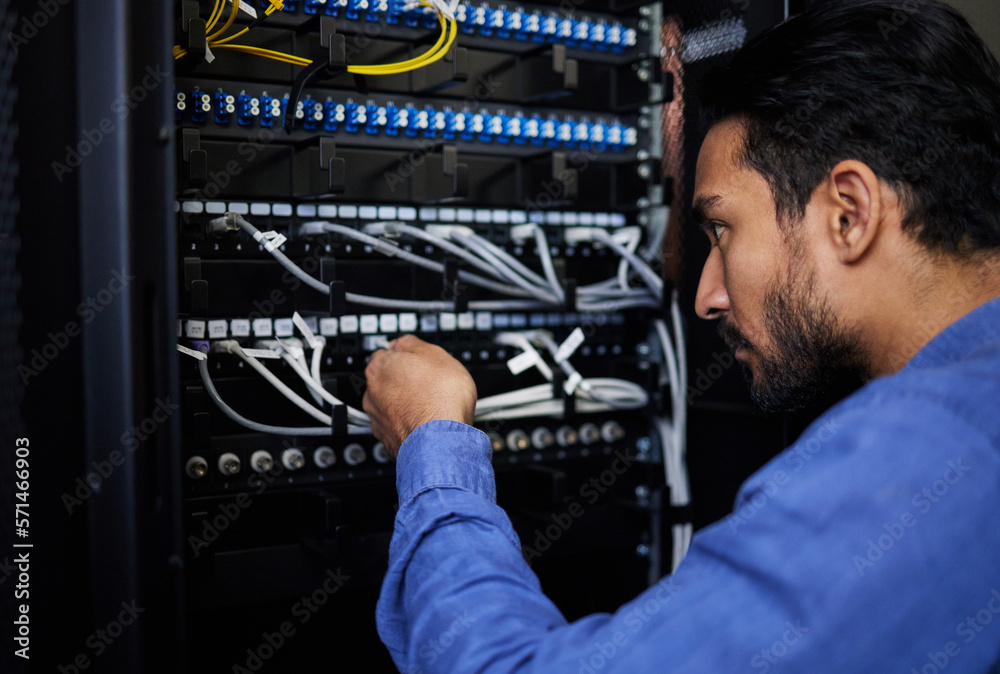 Poster Engineer, server room and man with cable connection for software update or maintenance at night. Information technology wire, cloud computing and male programmer check database network in data center