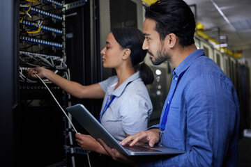 Man, woman or server room maintenance on laptop IT, software programming ideas or cybersecurity...