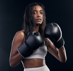 Boxer, fight and portrait of woman on black background for sports, strong focus or mma training....